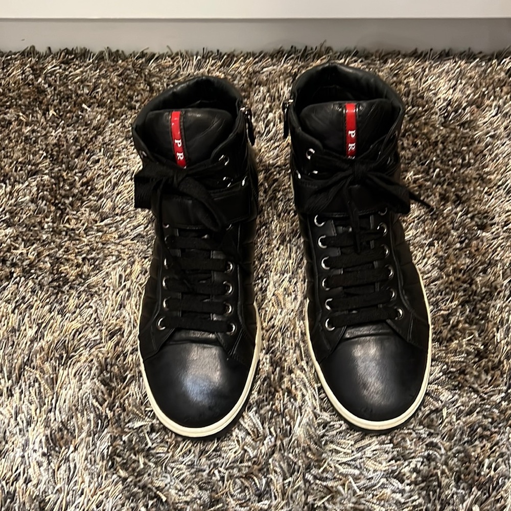 Prada Mens Black 8.5 high top Lamb leather sneaker.